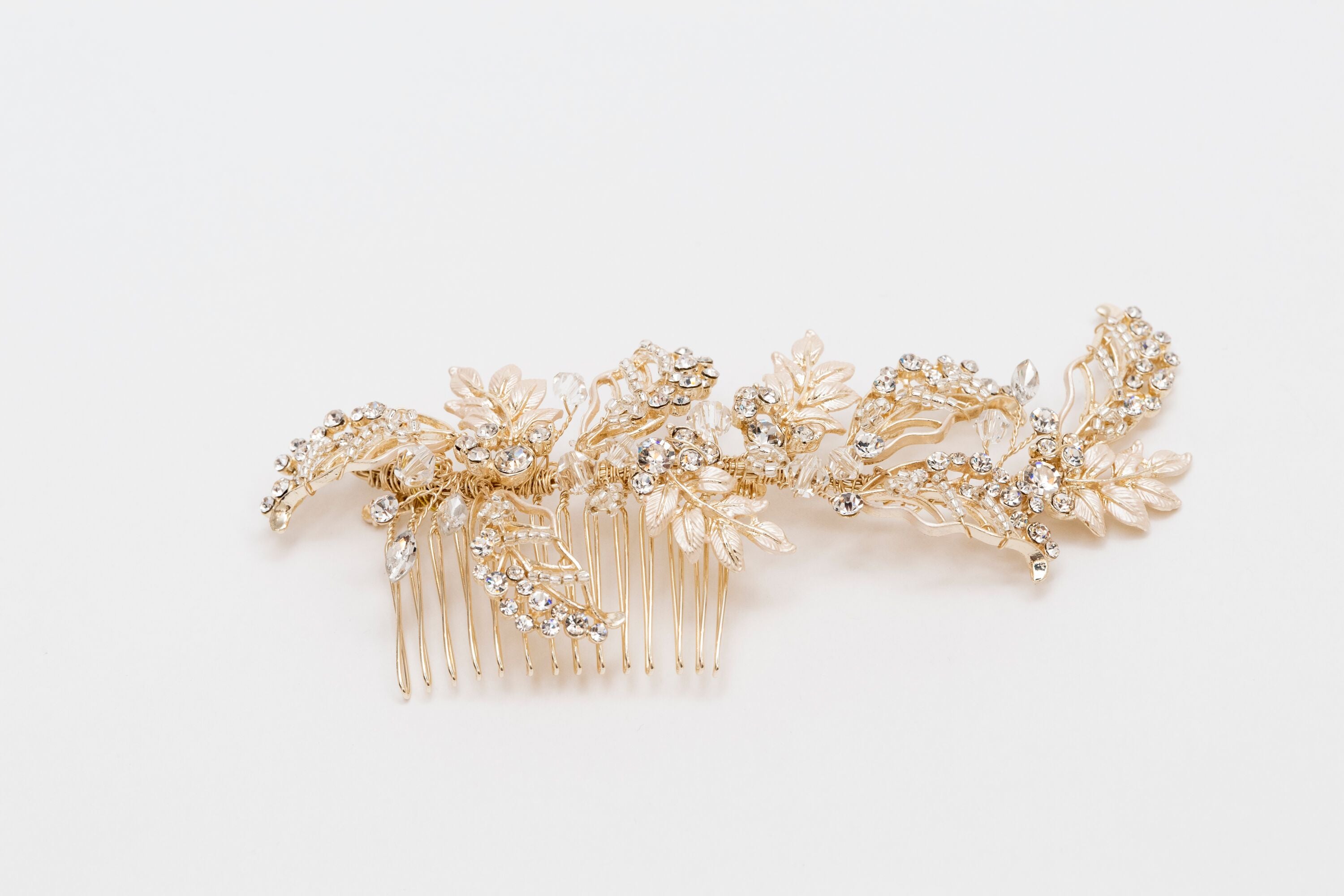 ivory knot-bridal hair combs-belle gold